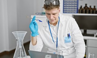Lab scientist with equipment